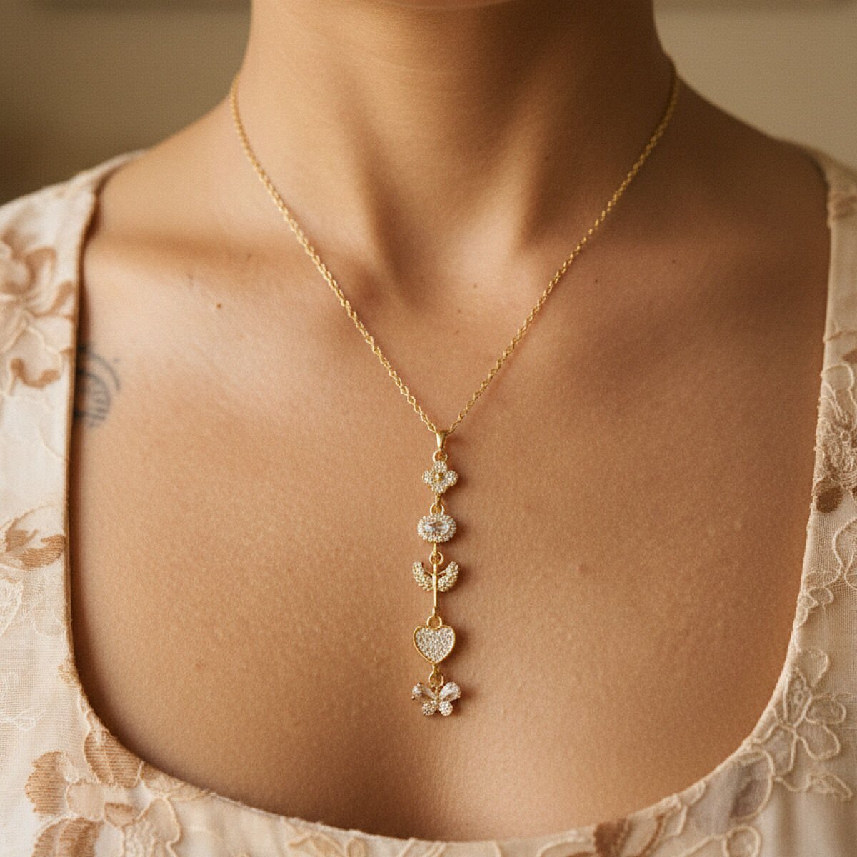 Anka Kuşu Kalp ve Kelebek Detaylı Çelik Kolye